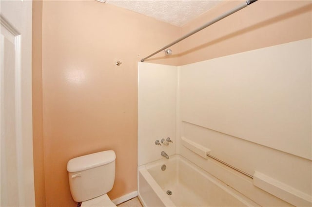 4161 Windermere Dr, Lithonia, GA 30038 - bathroom featuring shower / bath combination, toilet, and a textured ceiling