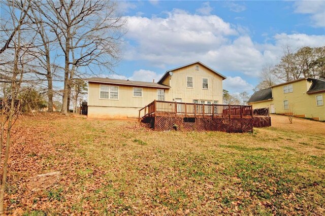 4161 Windermere Dr, Lithonia, GA 30038 - rear view of property featuring a lawn and a deck