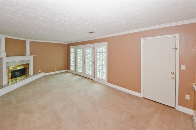 4161 Windermere Dr, Lithonia, GA 30038 - unfurnished living room featuring a textured ceiling, ornamental molding, carpet flooring, and a premium fireplace