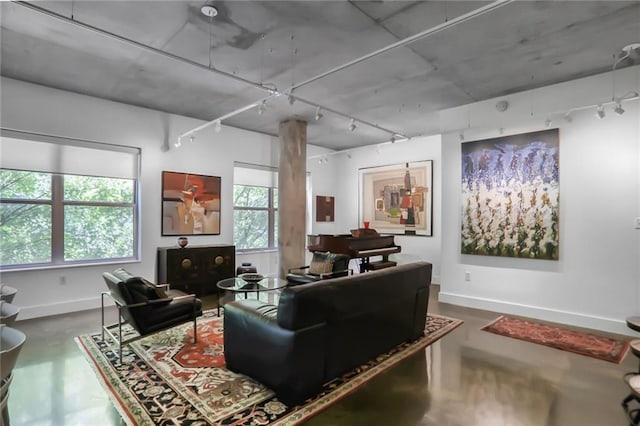 845 Spring St NW Unit 129, Atlanta, GA 30308 - living room with track lighting, concrete floors, and baseboards