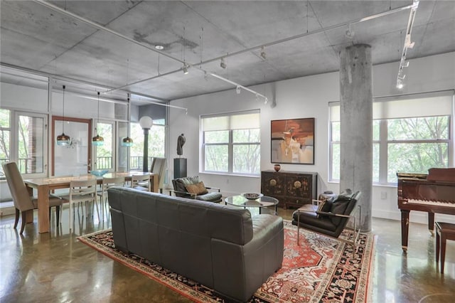 845 Spring St NW Unit 129, Atlanta, GA 30308 - living room with concrete flooring and rail lighting