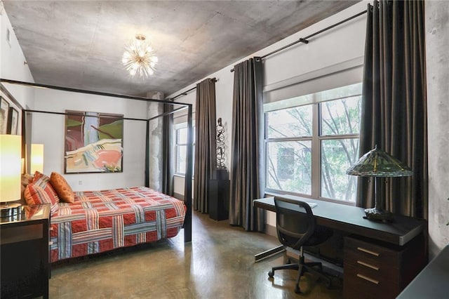 845 Spring St NW Unit 129, Atlanta, GA 30308 - bedroom featuring finished concrete floors and a desk