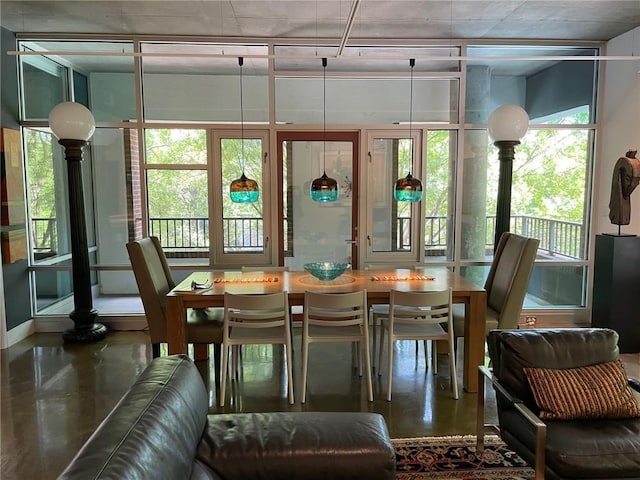 845 Spring St NW Unit 129, Atlanta, GA 30308 - dining area featuring finished concrete flooring