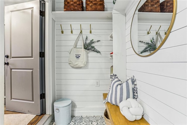 bathroom with wooden walls