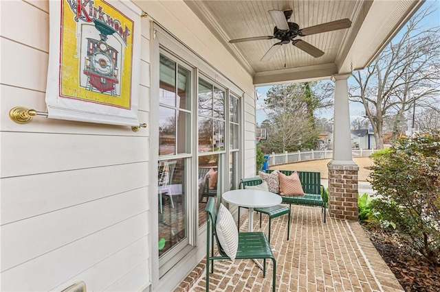 balcony with ceiling fan and covered porch