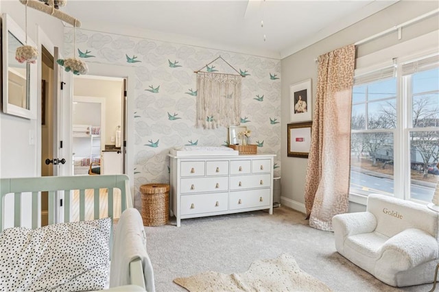 carpeted bedroom with crown molding