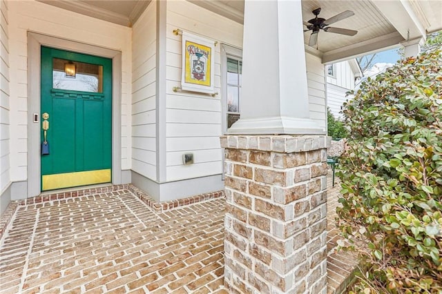 property entrance with ceiling fan