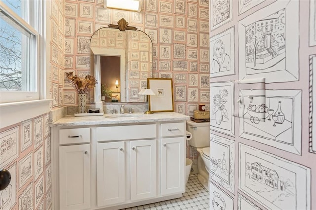 bathroom with vanity and toilet