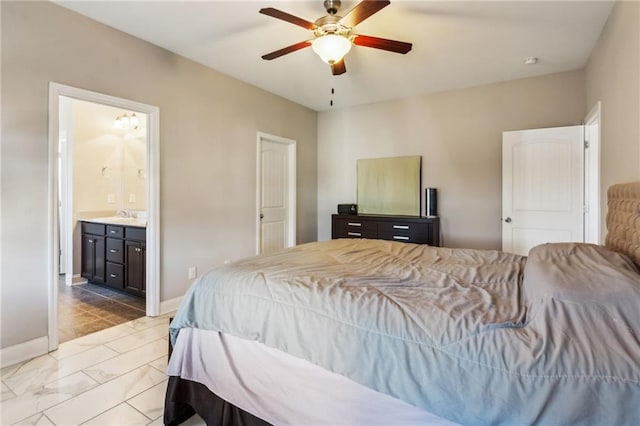 bedroom featuring connected bathroom and ceiling fan