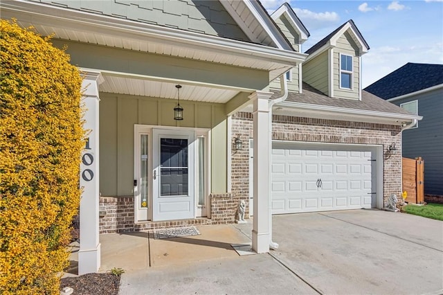 entrance to property featuring a garage