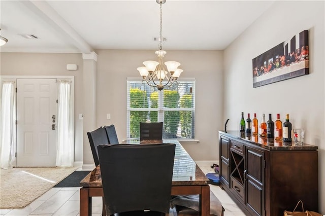 dining space featuring light tile patterned flooring, a chandelier, and beamed ceiling