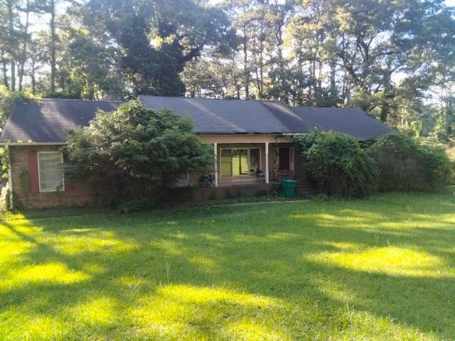 1627 Norden Rd, Riverdale, GA 30296 - view of front of house featuring a front yard and a porch