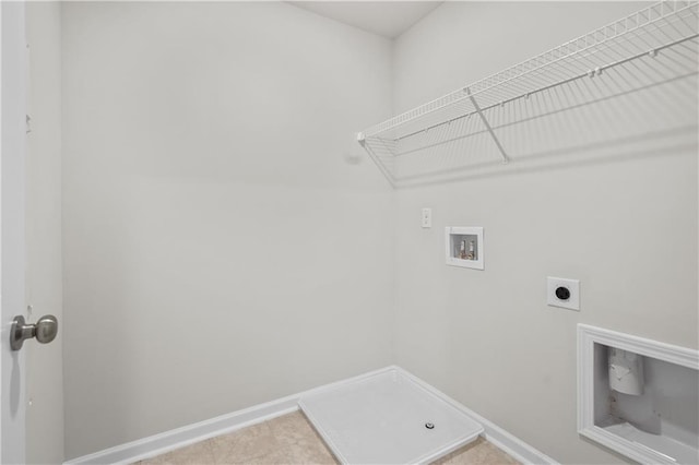 laundry room featuring washer hookup and electric dryer hookup