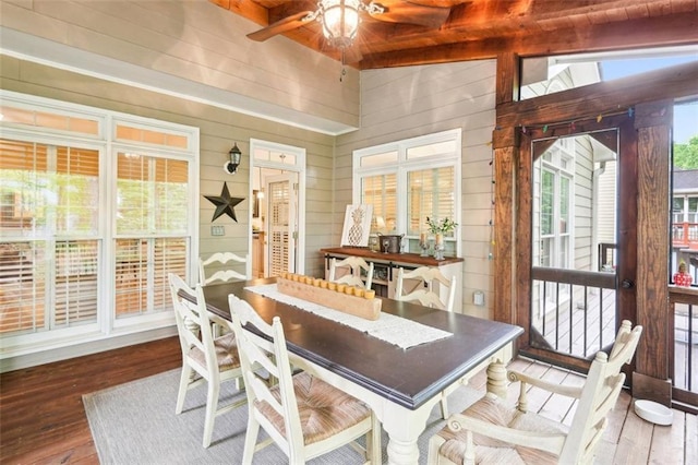 sunroom featuring beam ceiling