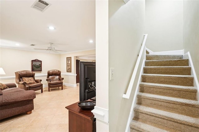 stairs with tile patterned flooring, a ceiling fan, visible vents, and recessed lighting