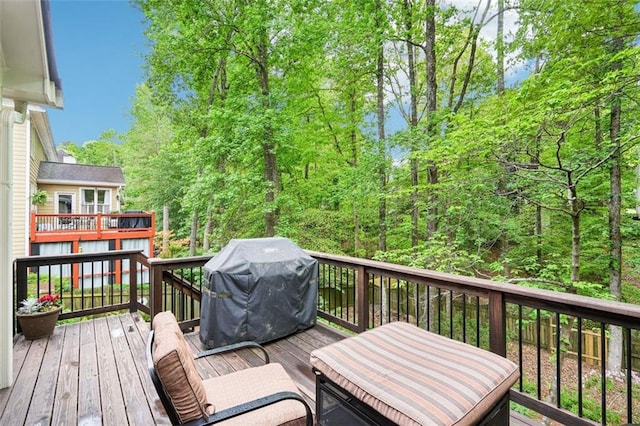 wooden terrace with grilling area