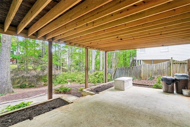 view of patio / terrace featuring fence