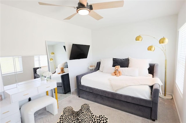 382 Winston Cir, Canton, GA 30114 - bedroom featuring light colored carpet, multiple windows, and ceiling fan