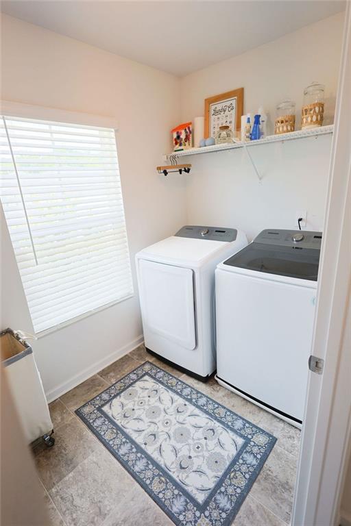 382 Winston Cir, Canton, GA 30114 - washroom featuring washer and clothes dryer and baseboards