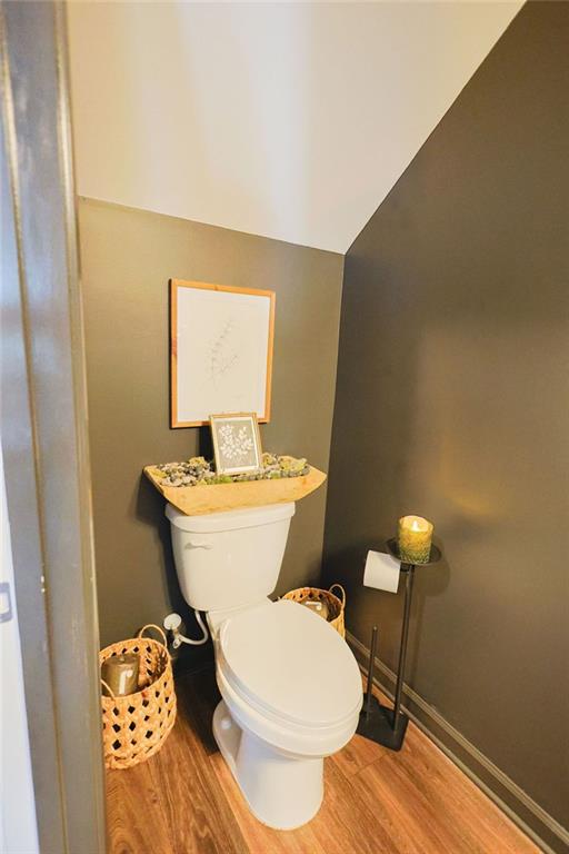 382 Winston Cir, Canton, GA 30114 - bathroom with wood finished floors, toilet, and baseboards