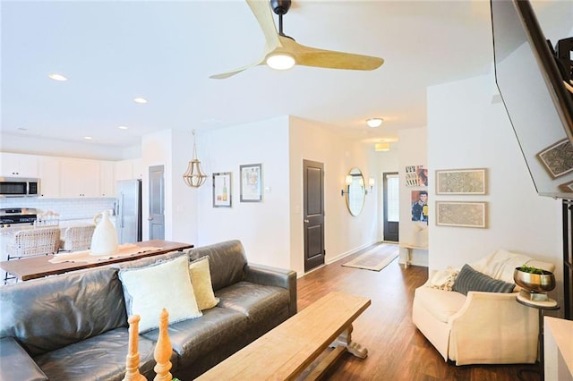 382 Winston Cir, Canton, GA 30114 - living room featuring wood finished floors, a ceiling fan, and recessed lighting