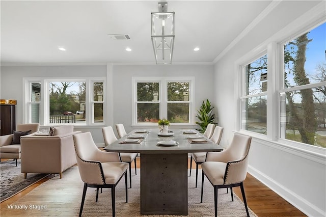 sunroom / solarium featuring visible vents