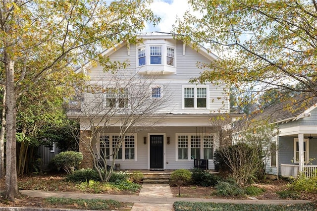 view of front of property featuring covered porch