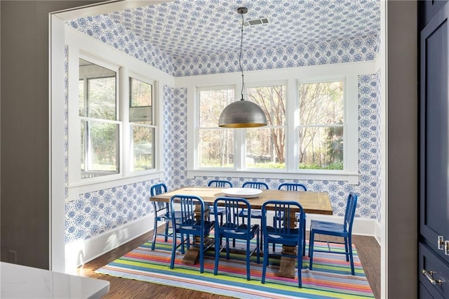 dining room featuring wood-type flooring