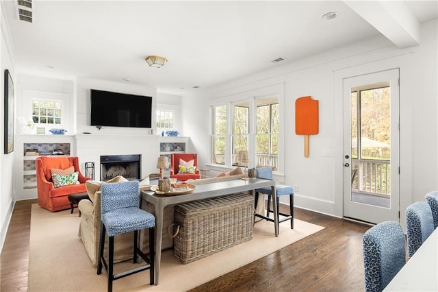 living room featuring dark hardwood / wood-style flooring