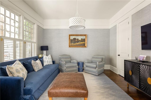 living room with dark hardwood / wood-style flooring