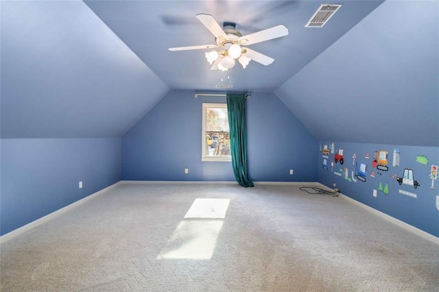 bonus room with ceiling fan, light colored carpet, and lofted ceiling