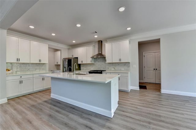 6867 Kate Ln, Flowery Branch, GA 30542 - kitchen featuring wall chimney exhaust hood, refrigerator with ice dispenser, ornamental molding, decorative backsplash, and light countertops