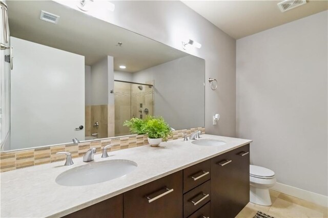 20 10th St NW Unit 704, Atlanta, GA 30309 - full bath with a shower with door, double vanity, and tile patterned floors