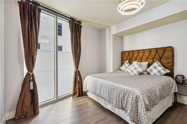 20 10th St NW Unit 704, Atlanta, GA 30309 - bedroom featuring wood finished floors