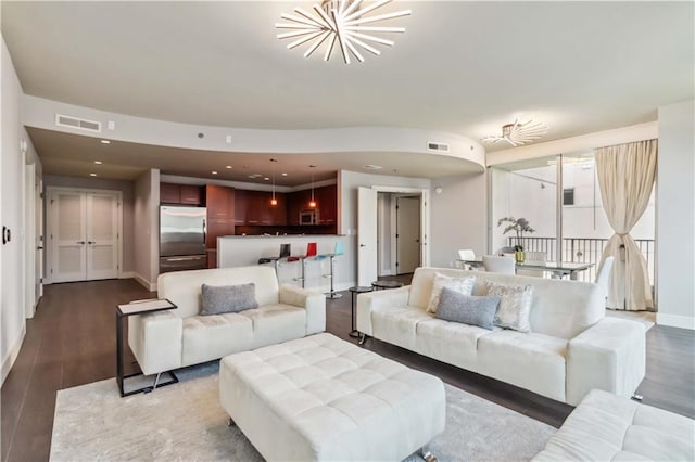 20 10th St NW Unit 704, Atlanta, GA 30309 - living area featuring wood finished floors and recessed lighting