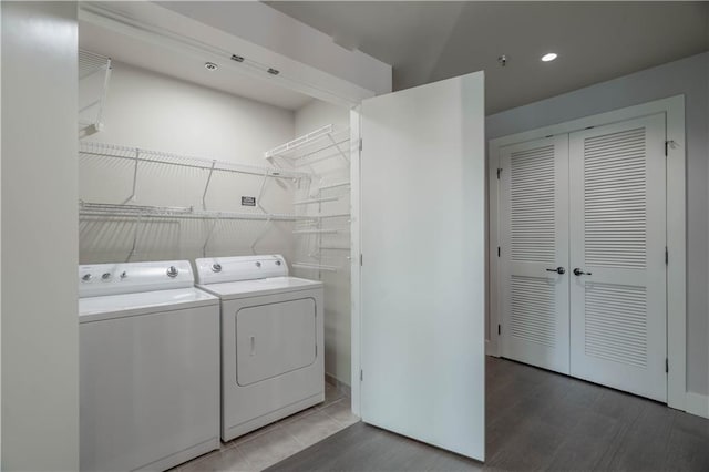 20 10th St NW Unit 704, Atlanta, GA 30309 - laundry room with washer and dryer, recessed lighting, and wood finished floors
