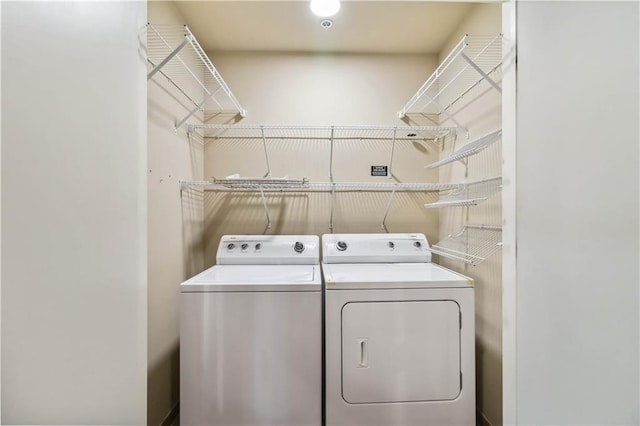 20 10th St NW Unit 704, Atlanta, GA 30309 - laundry area featuring washing machine and dryer