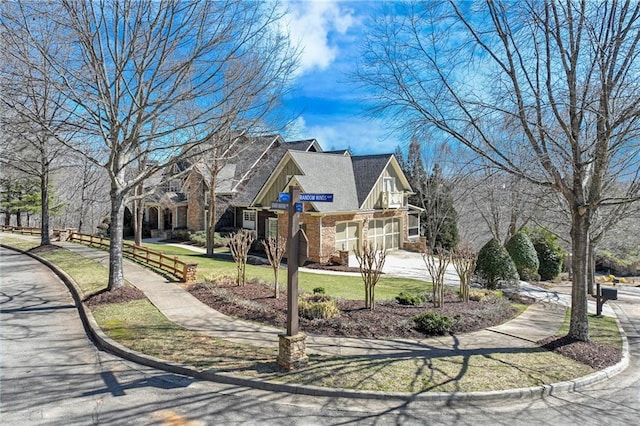 view of property exterior with stone siding, brick siding, board and batten siding, and a yard