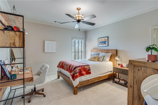 carpeted bedroom featuring visible vents, crown molding, and baseboards