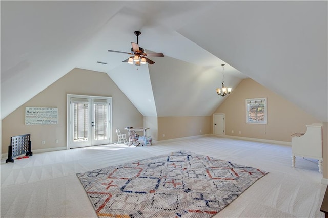 additional living space with carpet floors, baseboards, and vaulted ceiling