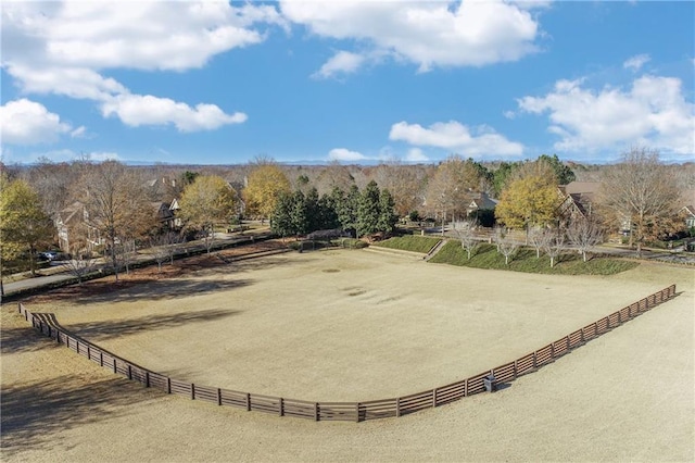 surrounding community with an enclosed area and a rural view