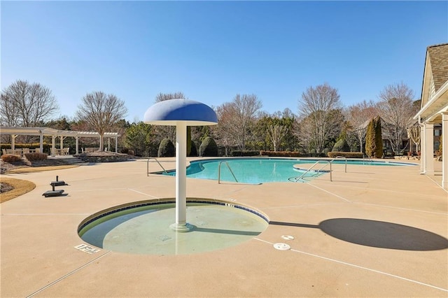 pool featuring a patio area, a hot tub, and a pergola