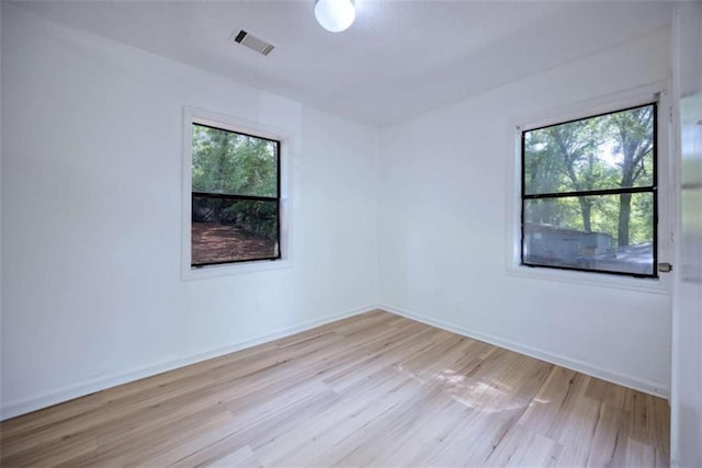 4618 Conner Rd, Columbus, GA 31903 - empty room featuring healthy amount of natural light and wood finished floors