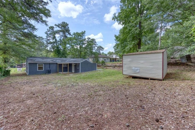 4618 Conner Rd, Columbus, GA 31903 - view of yard featuring a storage shed