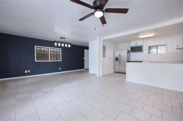 4618 Conner Rd, Columbus, GA 31903 - unfurnished living room with ceiling fan, light tile patterned flooring, and electric panel