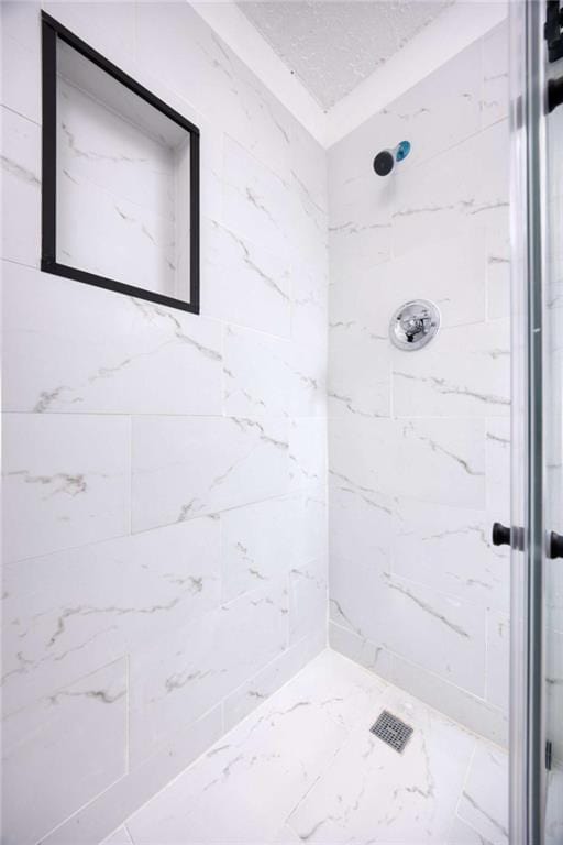 4618 Conner Rd, Columbus, GA 31903 - bathroom with a marble finish shower and marble look tiles