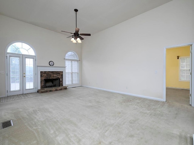5 Glenn Eagles Vw, Hiram, GA 30141 - unfurnished living room featuring carpet flooring, healthy amount of natural light, a high ceiling, and a ceiling fan