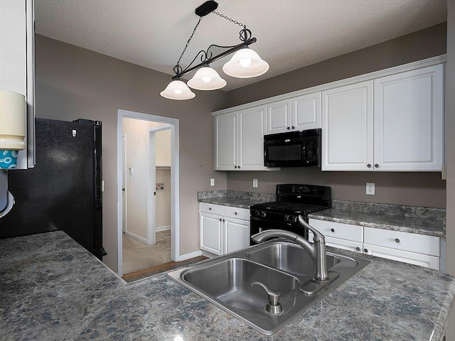 5 Glenn Eagles Vw, Hiram, GA 30141 - kitchen with black appliances, dark countertops, white cabinets, pendant lighting, and a textured ceiling