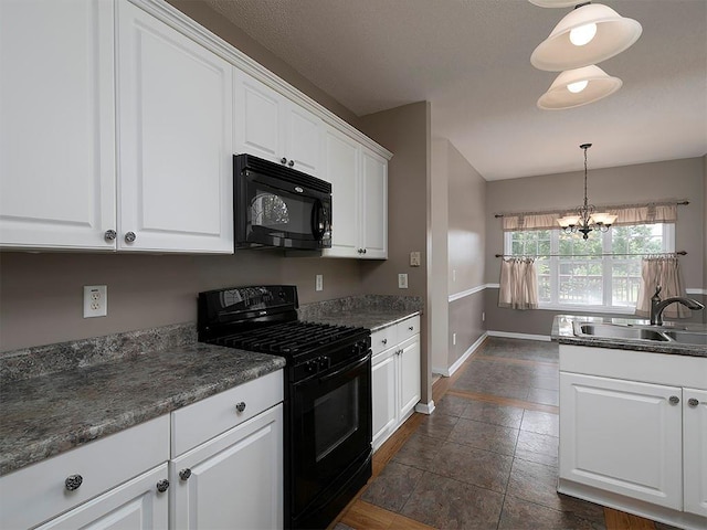 5 Glenn Eagles Vw, Hiram, GA 30141 - kitchen with black appliances, a chandelier, white cabinets, and dark countertops