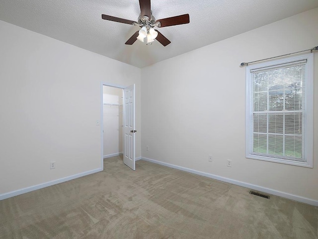 5 Glenn Eagles Vw, Hiram, GA 30141 - unfurnished room with light carpet, a ceiling fan, and a textured ceiling